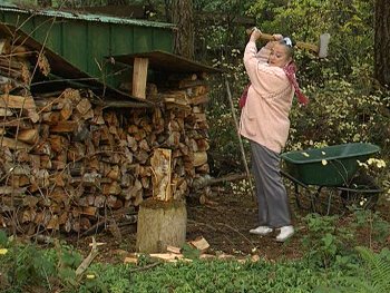 Marie chops wood.