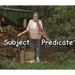 Marie standing with two pieces of firewood to explain what a subject and a predicate are.