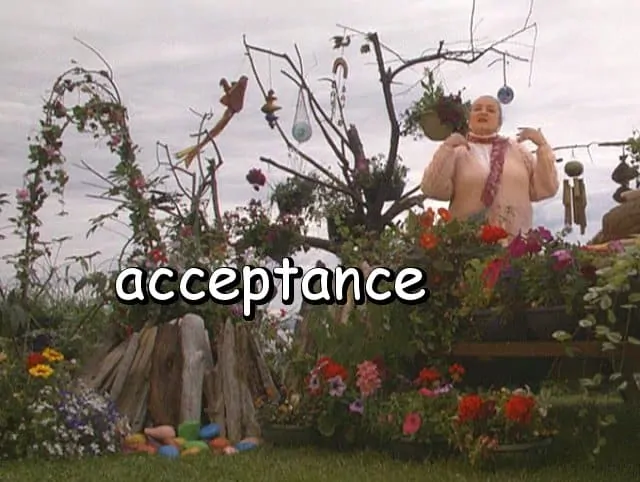 the word "acceptance" with Marie in her beach garden