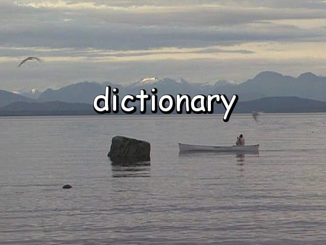 the word "dictionary" with Marie paddling a canoe past eagle rock