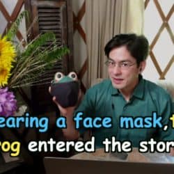 Wearing a face mask, the frog entered the store.