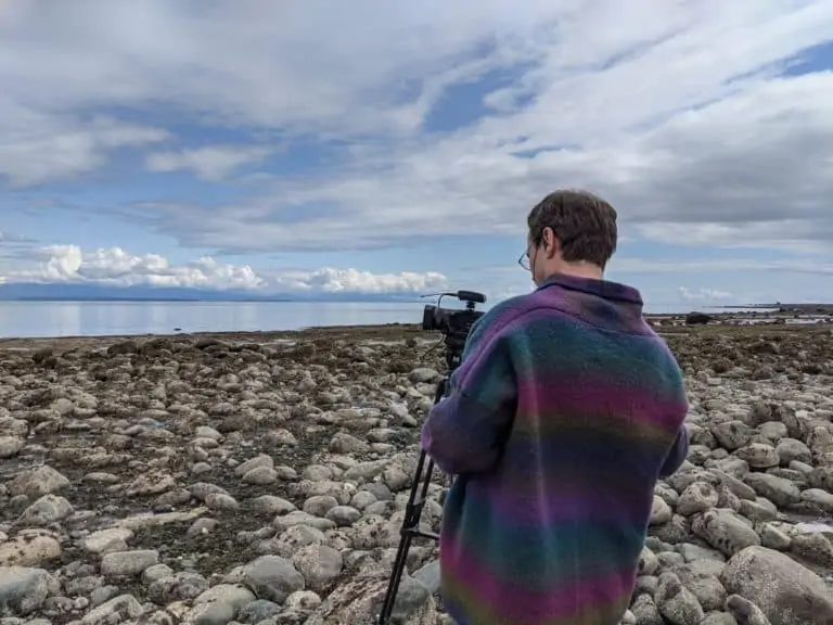 Cozy Grammar's Producer and Director filming on Discovery Passage in front of Marie's Cozy Beach Cottage