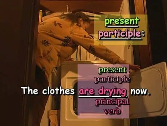 present participle: The clothes are drying now.